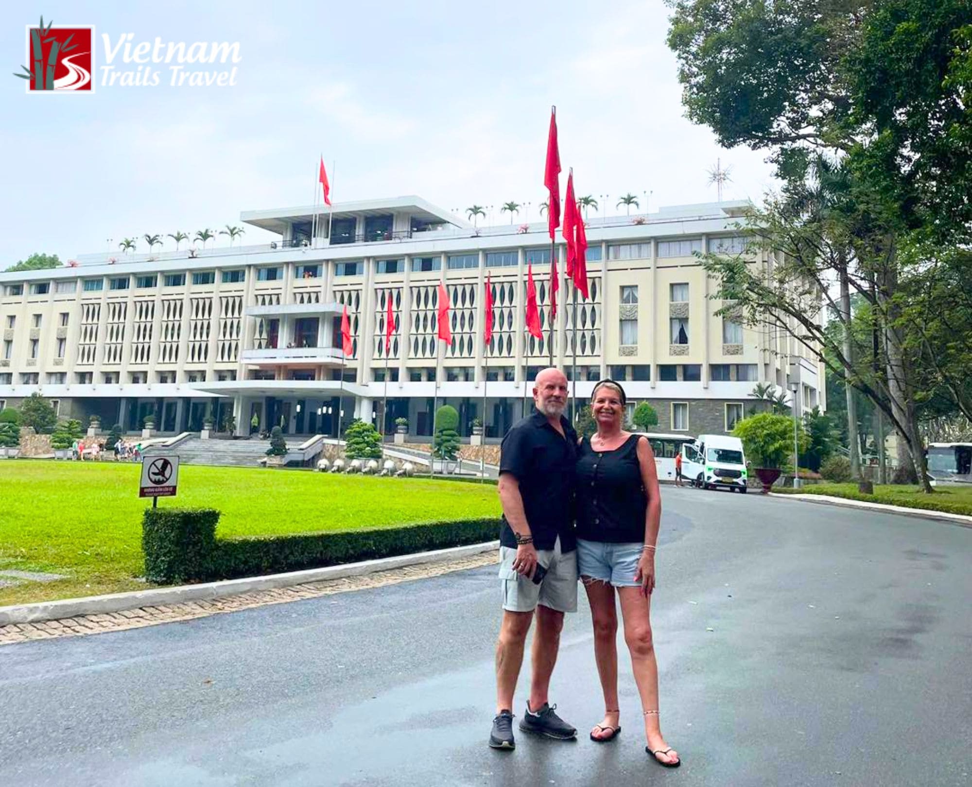Foreign tourists posing for a photo at the Independence Palace