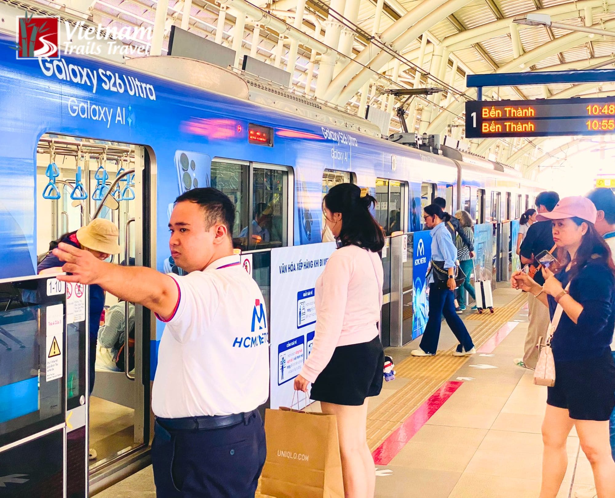 Passengers waiting at a modern elevated station of Ho Chi Minh City Metro Line 1