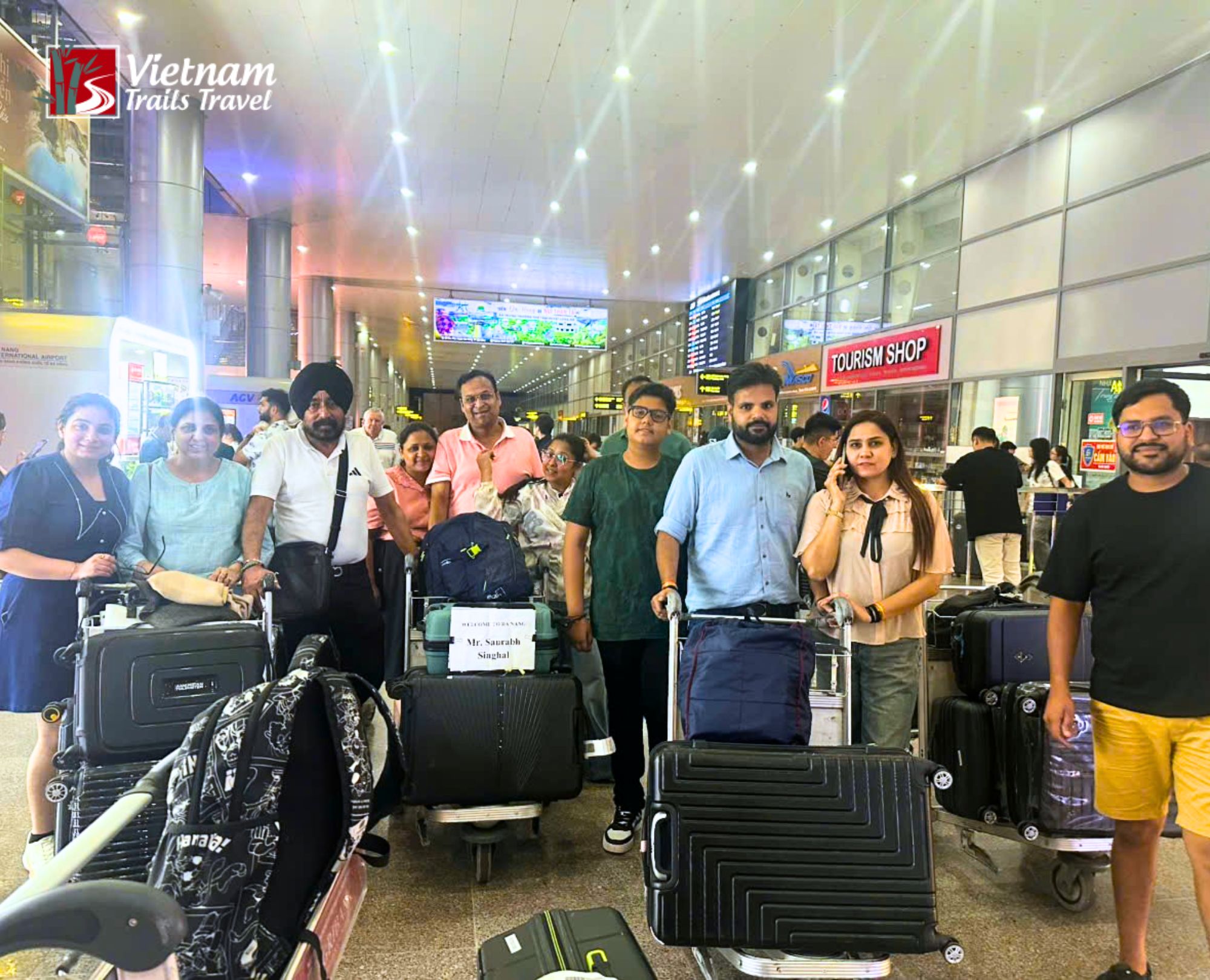 The driver picks up the Indian tourist group at Da Nang airport after they complete their visa procedures
