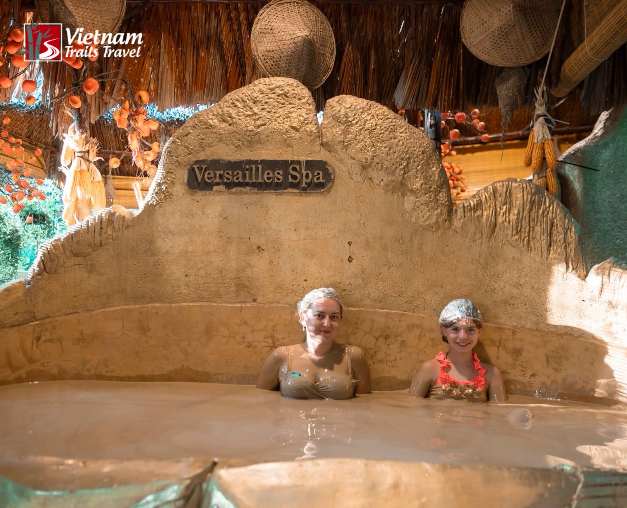 A mother and daughter share a joyful moment at Versailles Mud Bath, Spa & Beach Club in Phu Quoc
