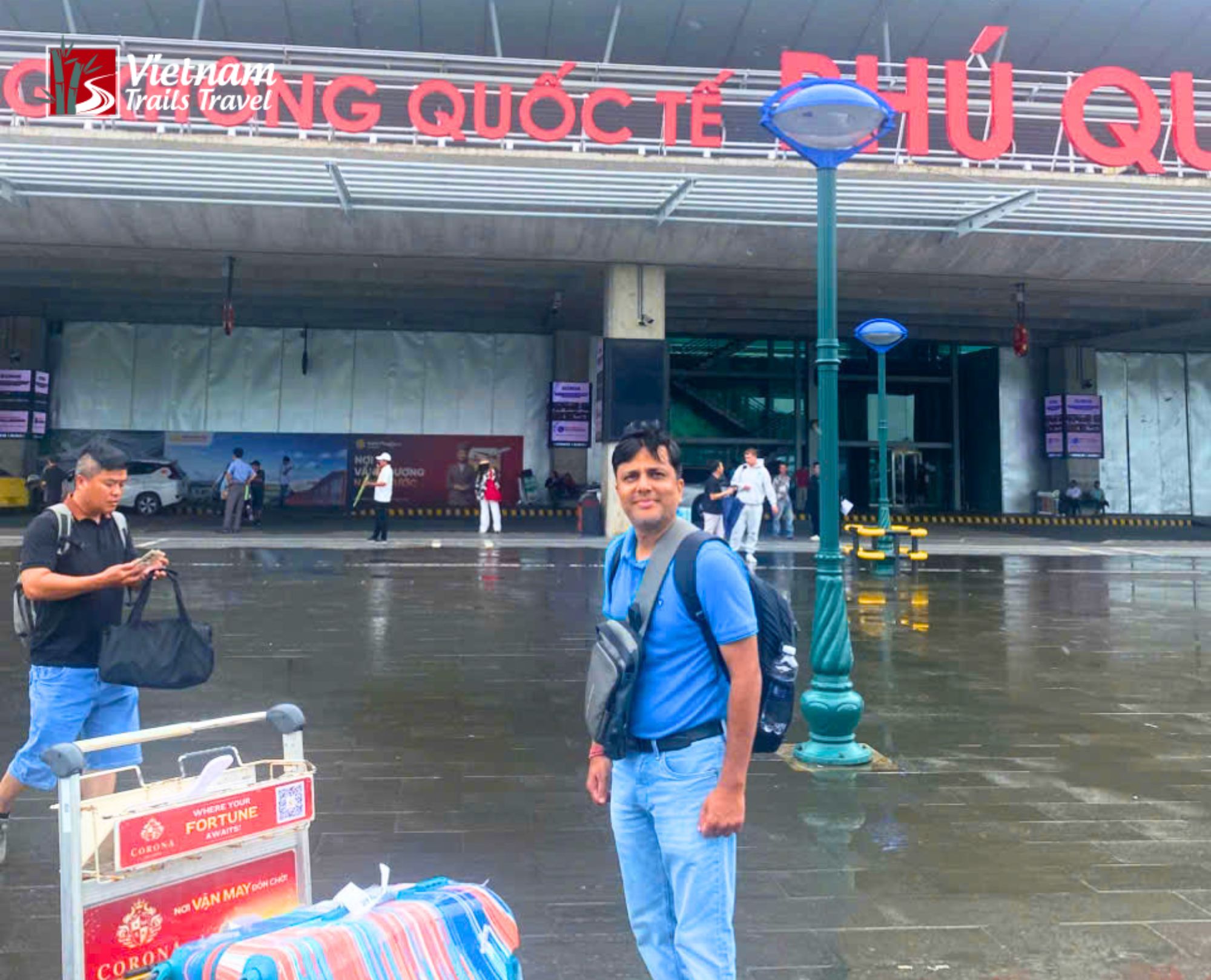 A traveler arrives at Phu Quoc International Airport with a big smile, ready to begin his island adventure