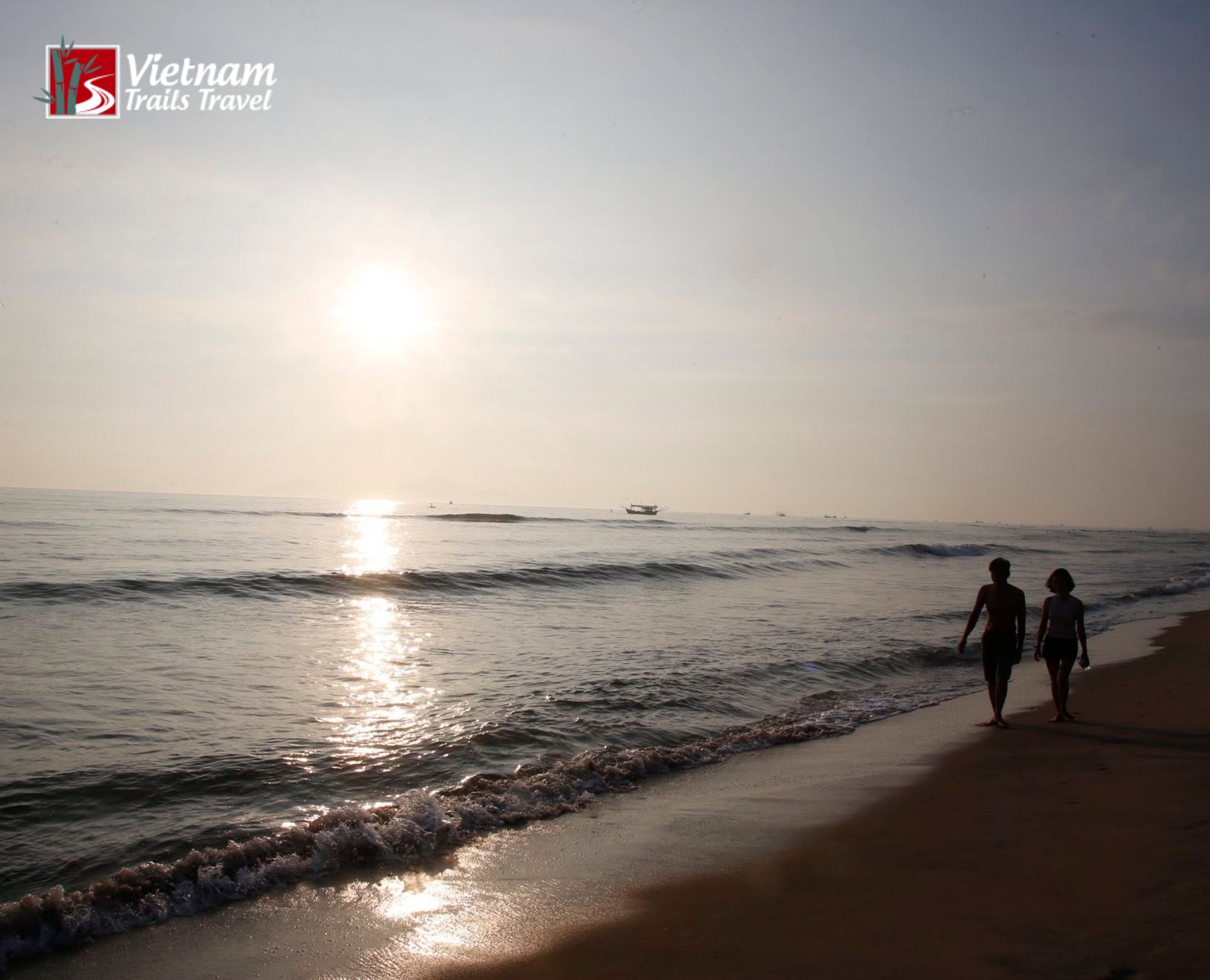 An Bang Beach at sunset is where travelers come to unwind, with gentle waves, cool sand, and a sky painted in soft colors