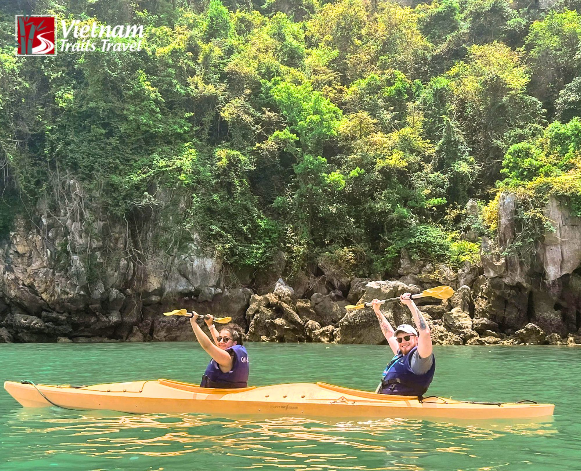 Happy kayakers enjoying Ha Long Bay adventure