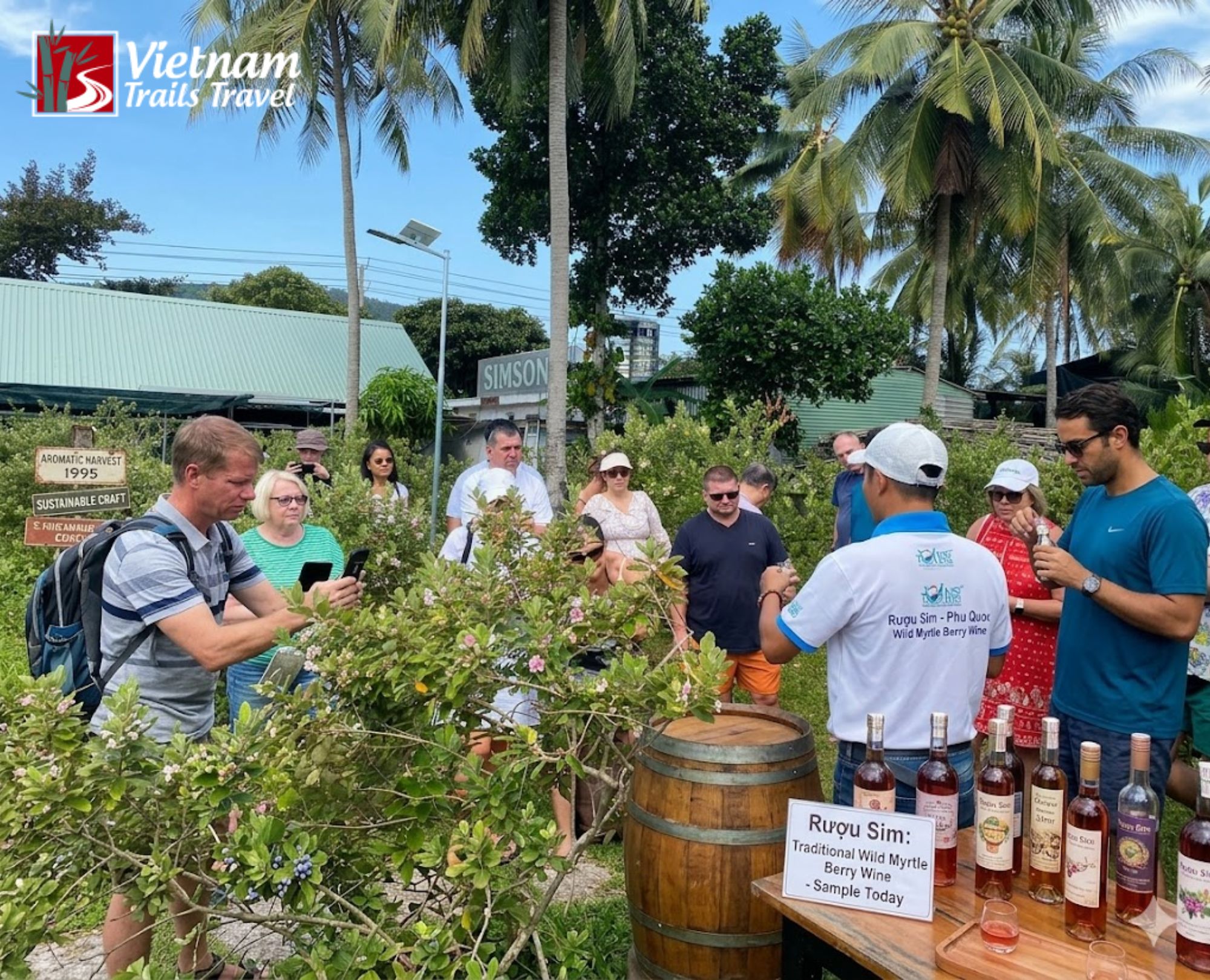 International visitors discovering the process of making wild myrtle wine during a Phu Quoc south island tour