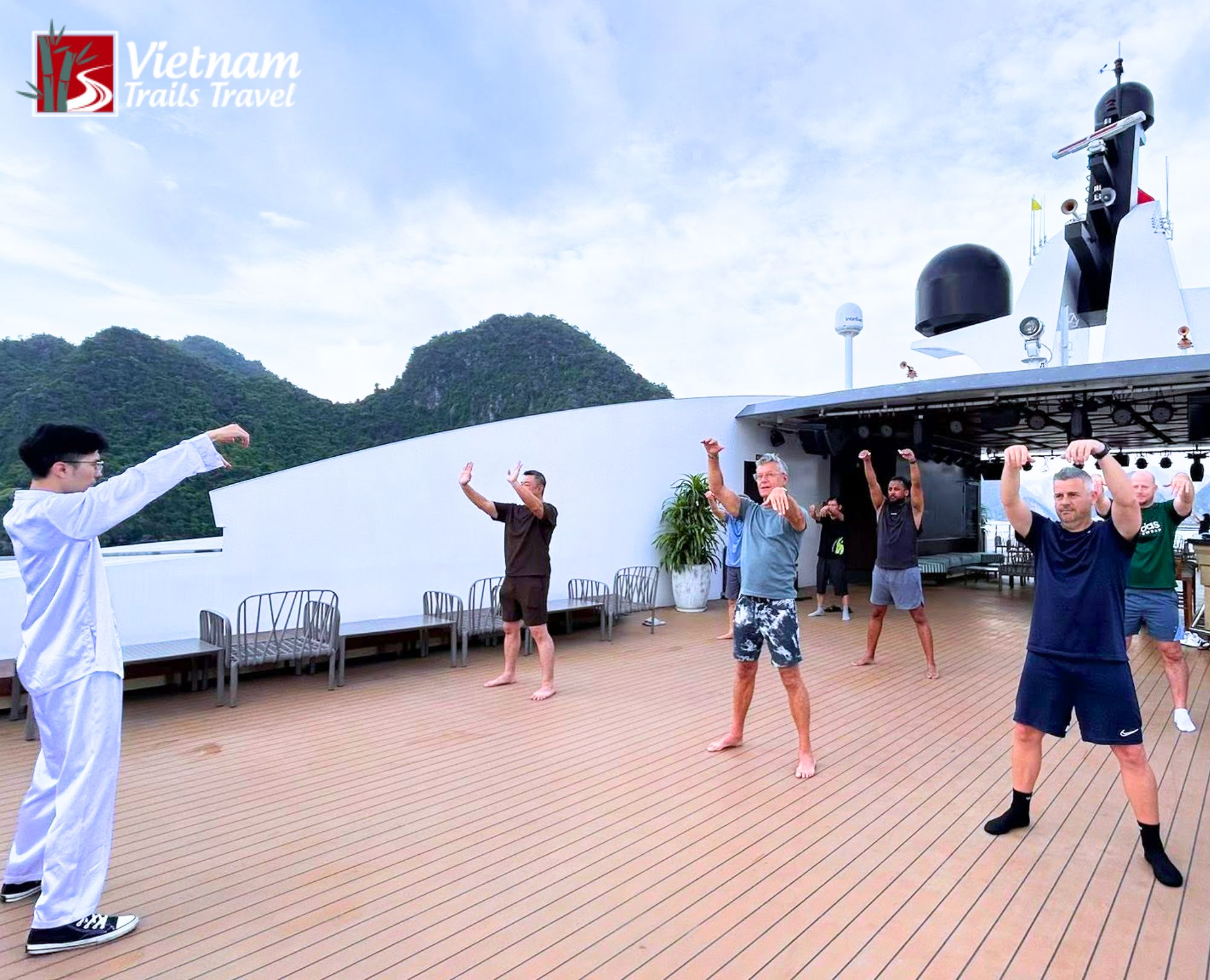 Morning Tai Chi session on Ha Long Bay cruise deck