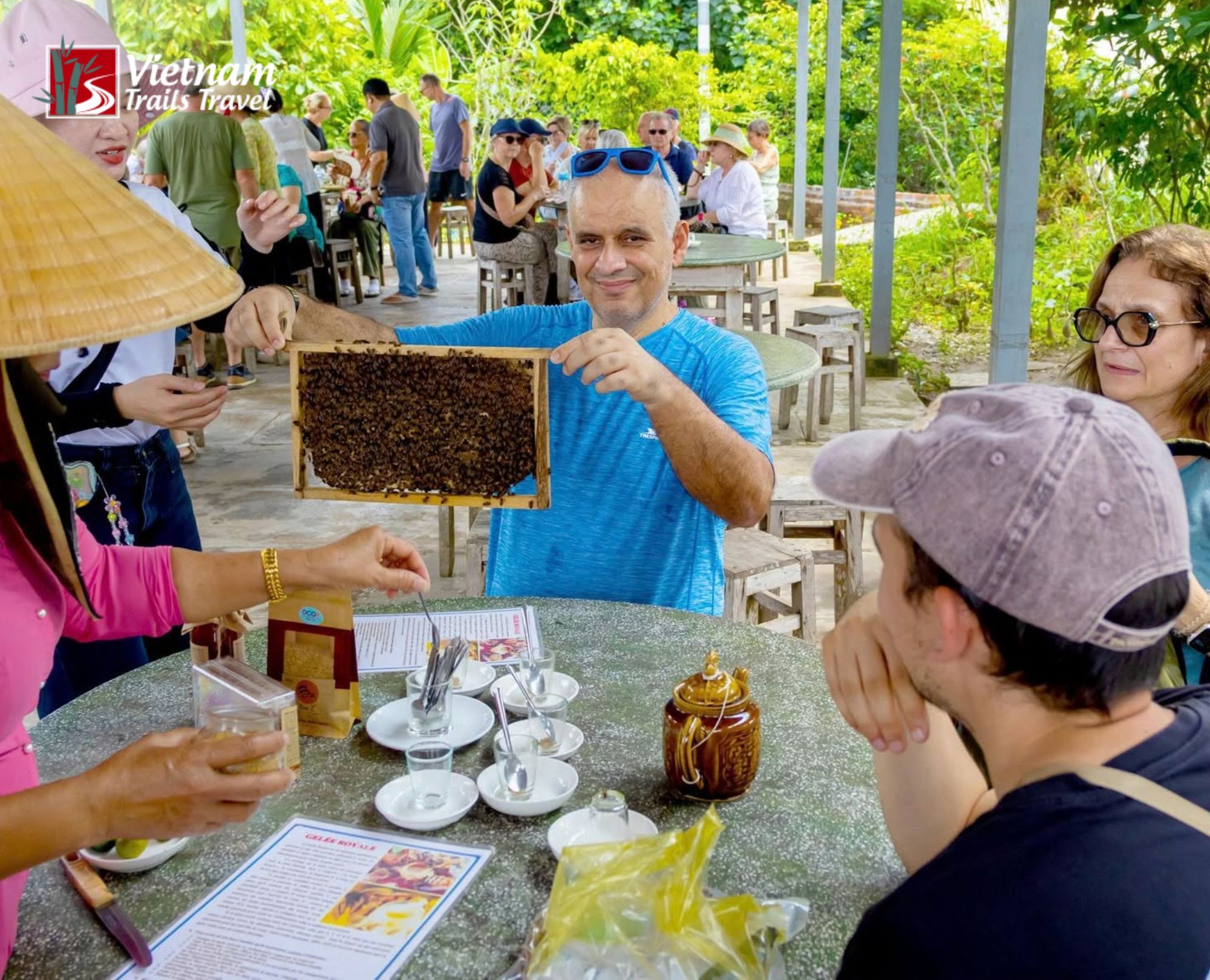 Tourists enjoying honey tea and traditional folk music