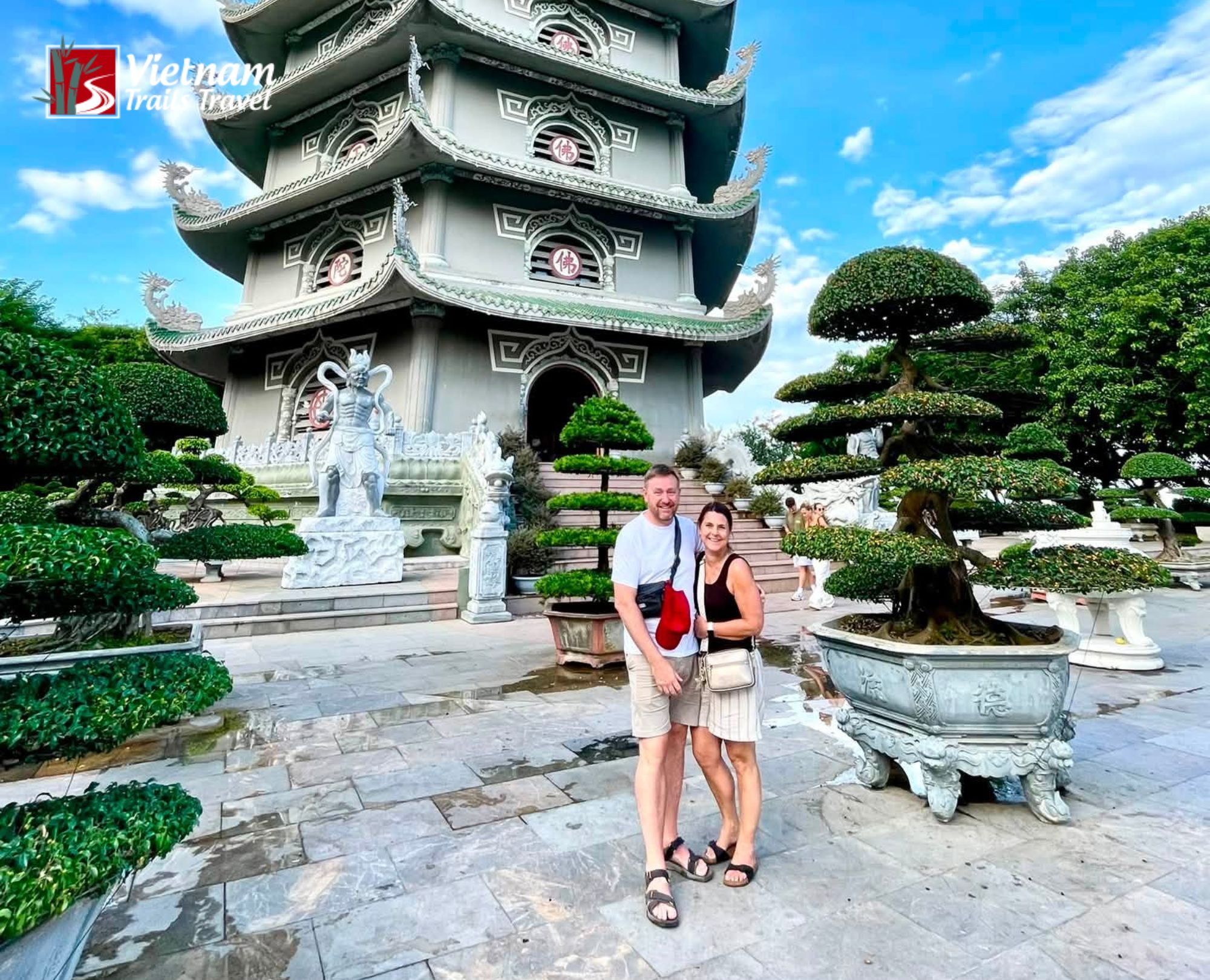 A couple posing for a photo at Linh Ung Pagoda on Son Tra Peninsula