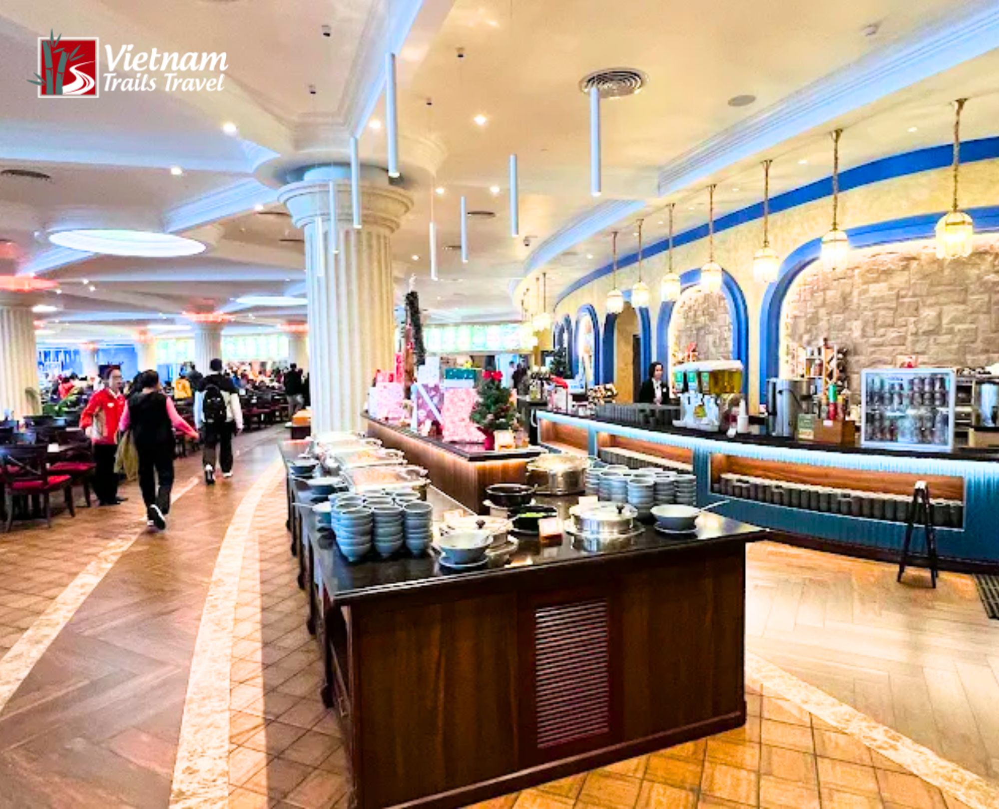 Enjoying Ba Na Hills buffet lunch on private tour with spacious restaurant and chafing dishes