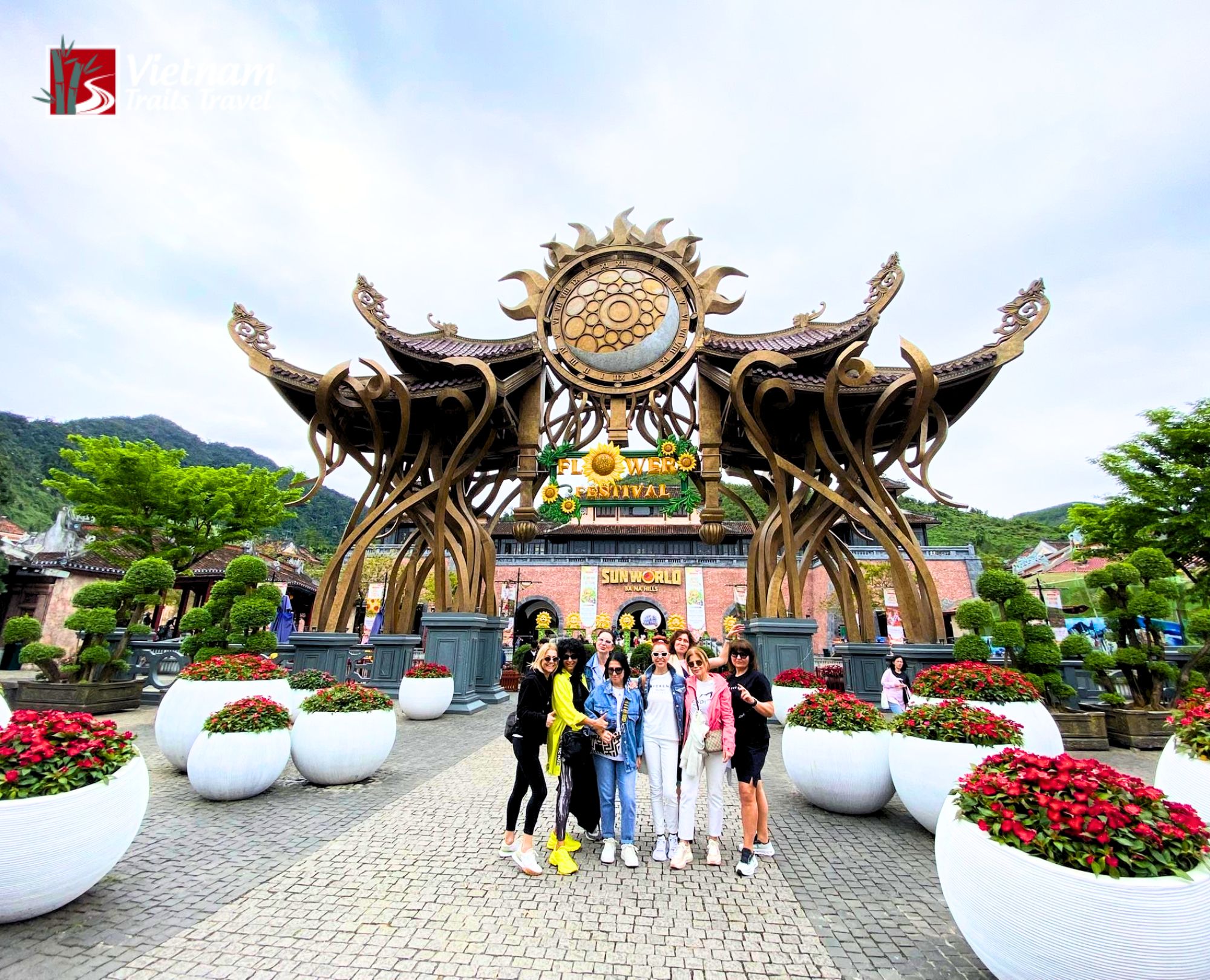 Guests posing at Sunworld main entrance as soon as guests arrive at Ba Na Hills
