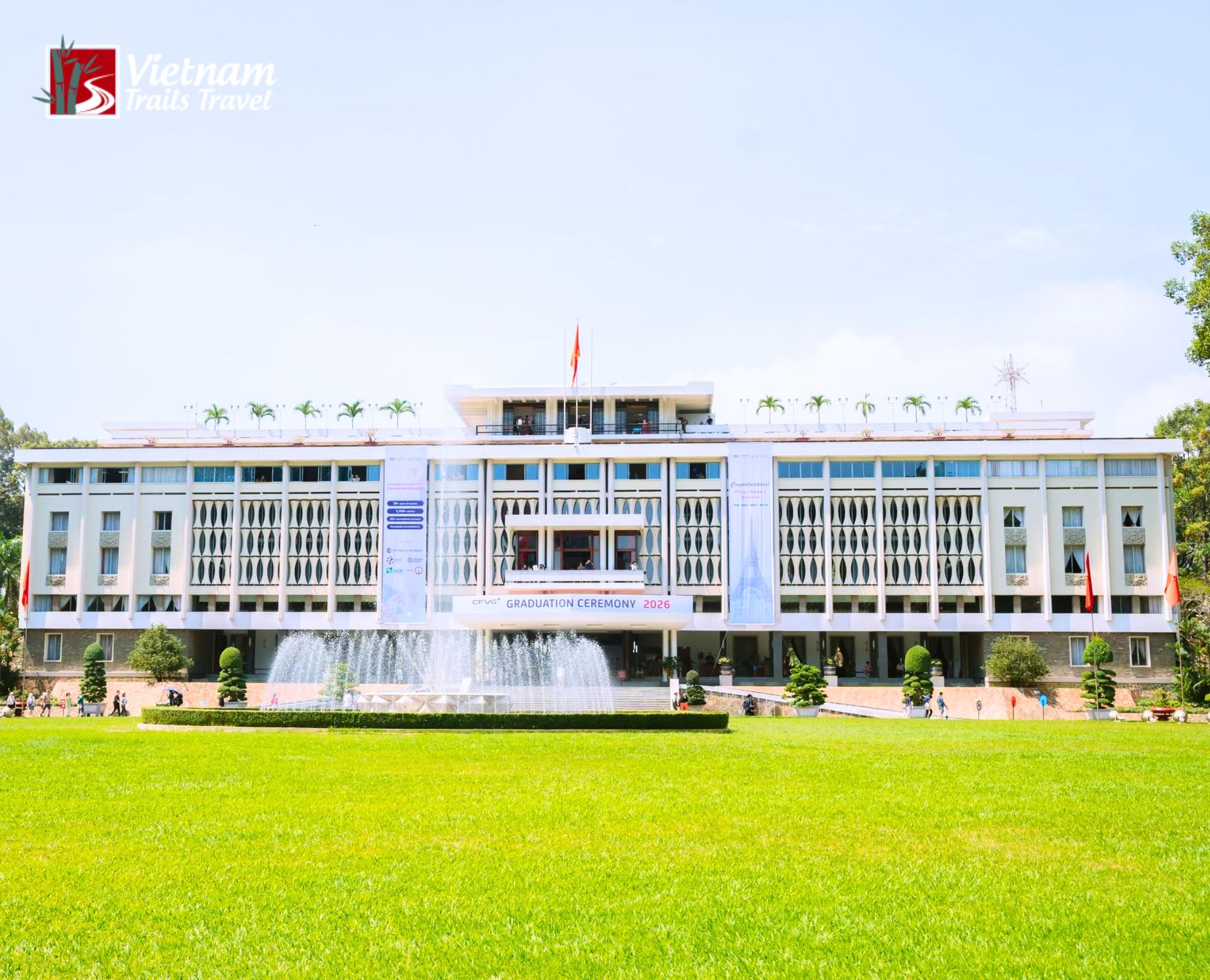 The grand symmetrical architecture of Independence Palace a symbol of Vietnam's reunification set against a bright blue sky