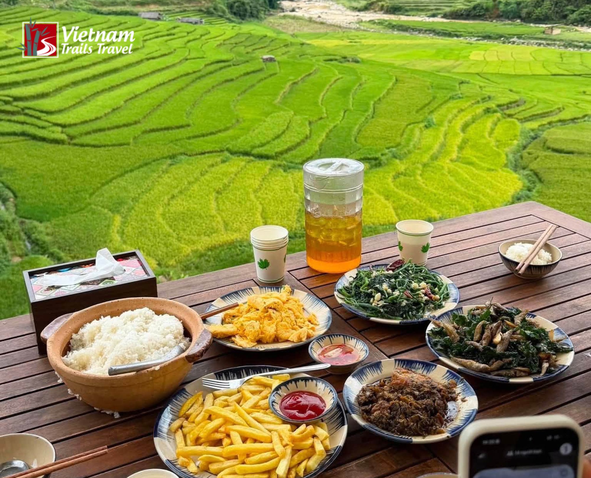 Travelers enjoying a traditional local lunch with authentic regional dishes