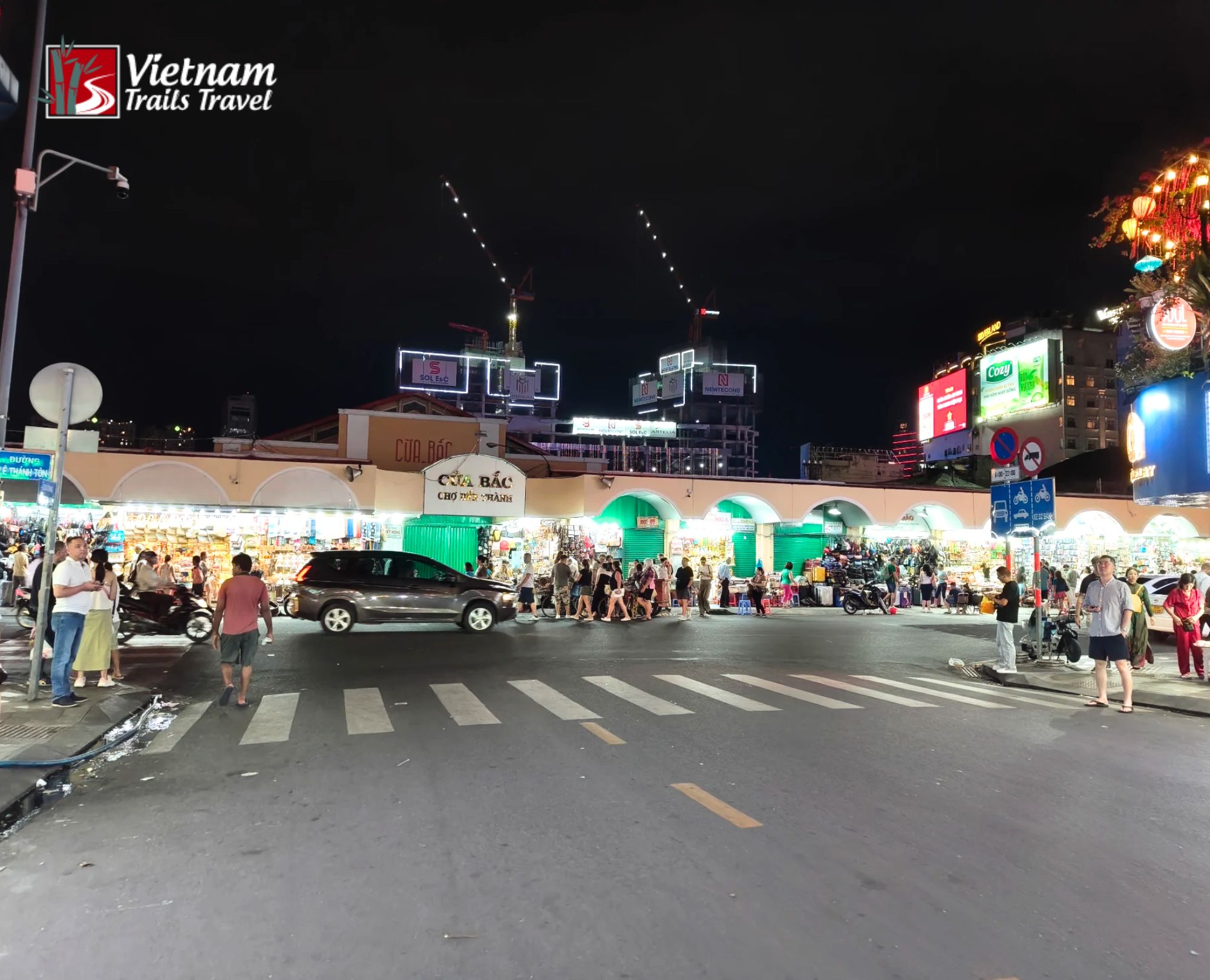 Ben Thanh Market at night vibrant outdoor food stalls and street life