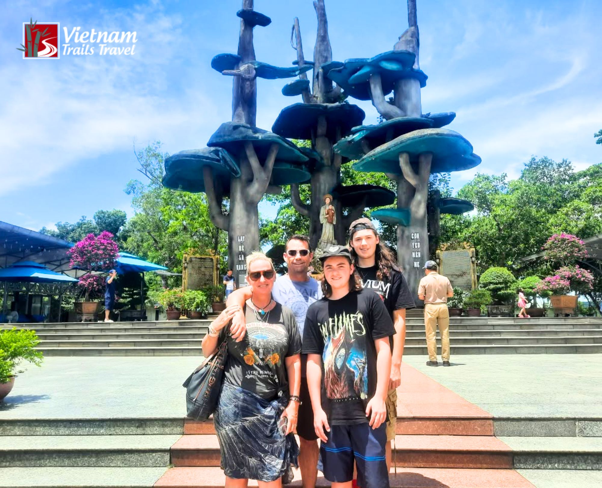 A memorable family photo at La Vang Holy Land pilgrimage site in Quang Tri Vietnam