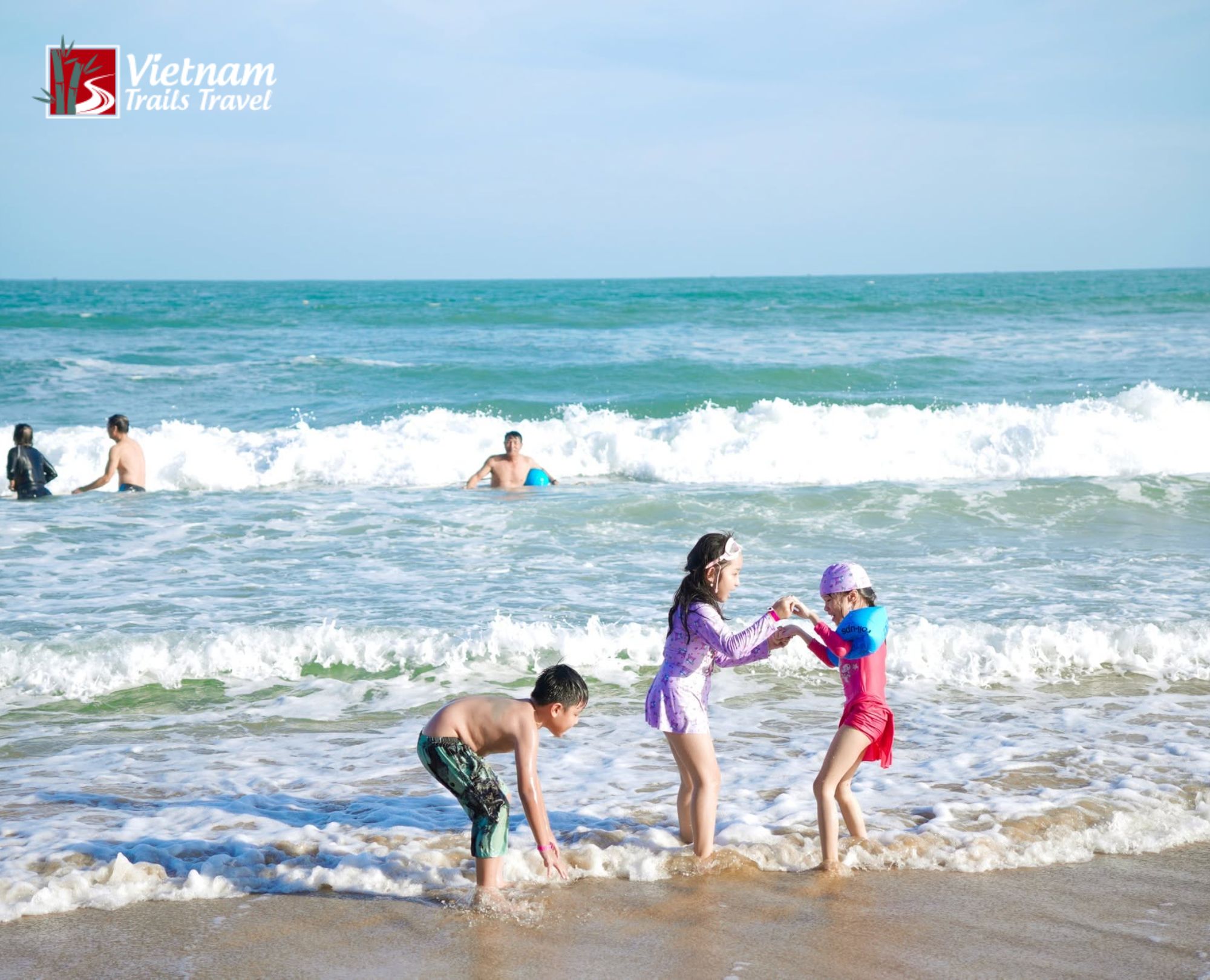 Families enjoying sunny weather during the ideal months to explore some of the best beaches in Vietnam