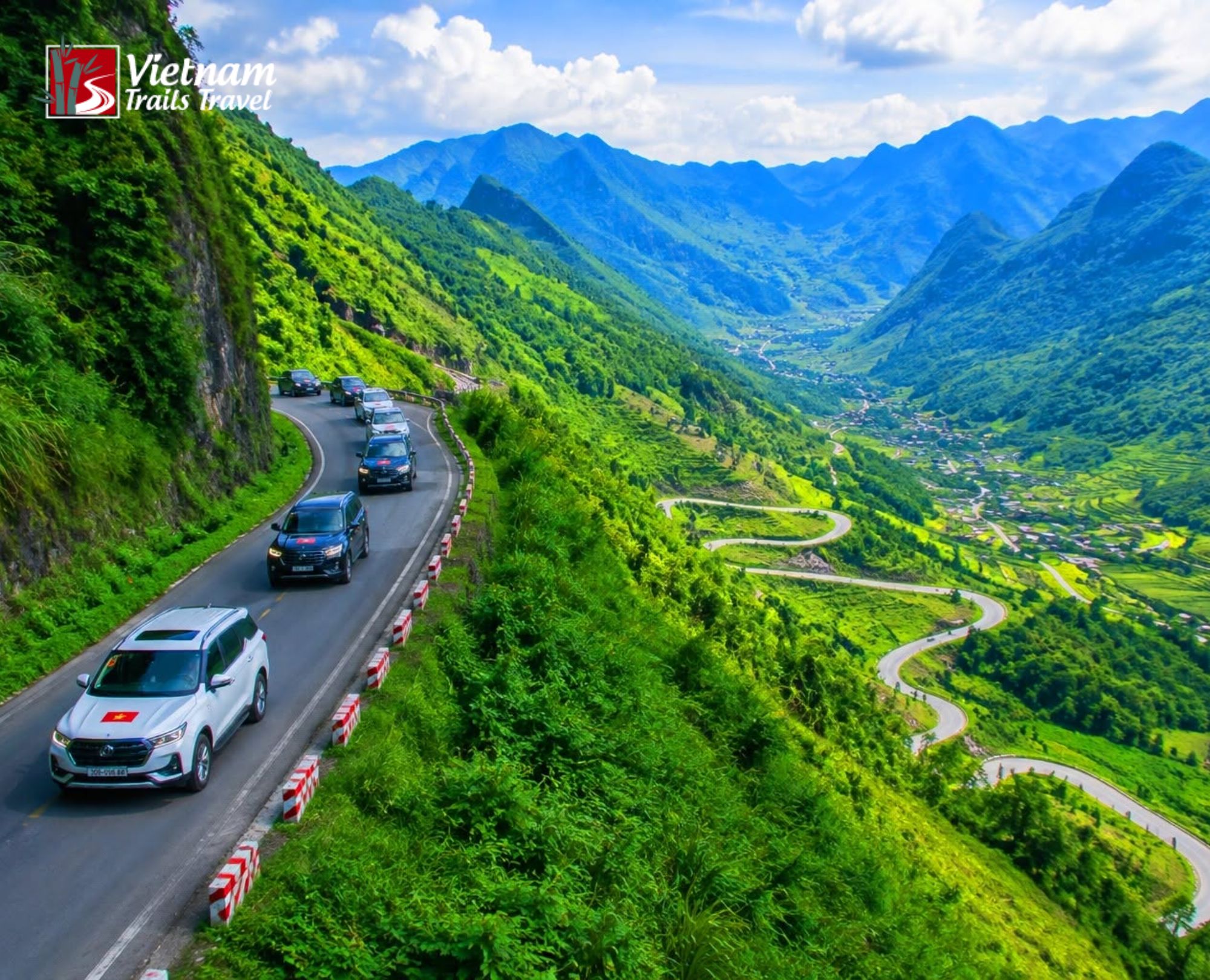 Riders on the Hanoi to Ha Giang city route thread their way along a mountain pass carved into the green slopes