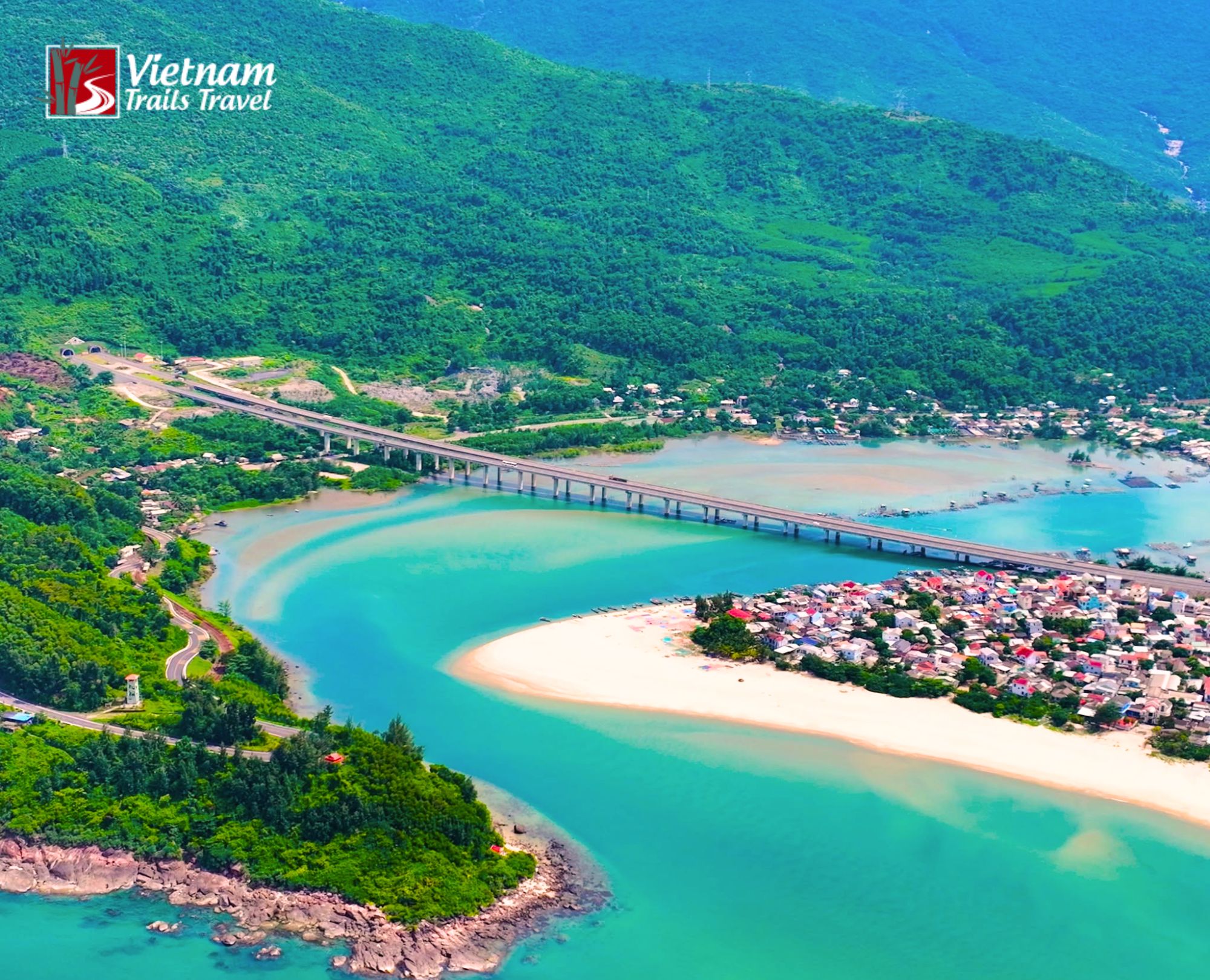 Stunning bird eye view capturing tranquil ocean waves rolling onto a sunlit tropical beach
