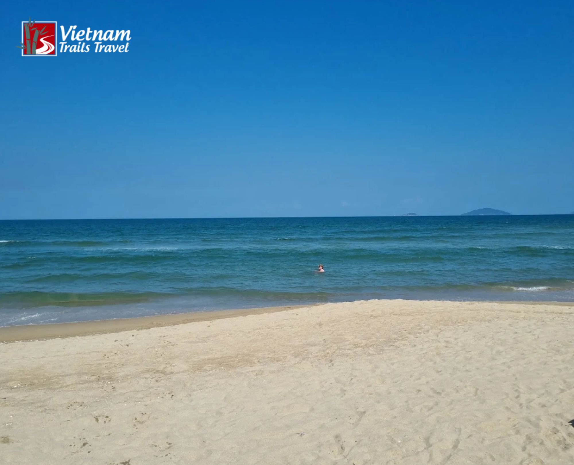 Stunning seaside view with clear blue sky and gentle waves at An Bang Beach