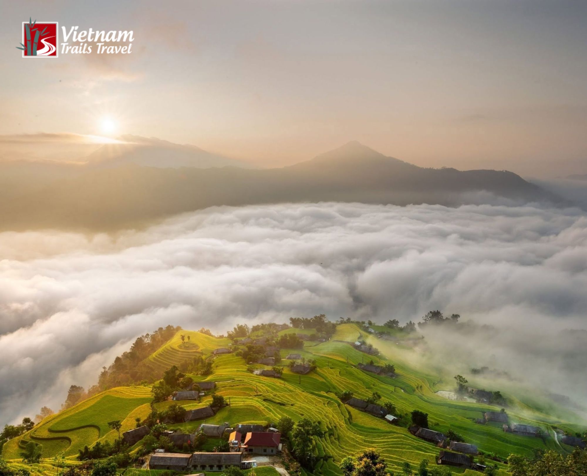 Sunrise over Hoang Su Phi rice terraces with a small village and misty mountains in northern Vietnam